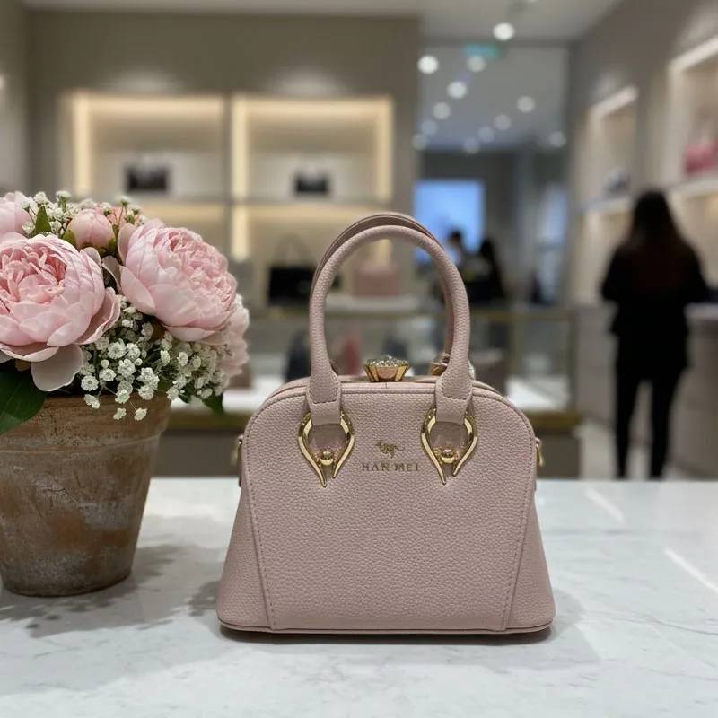 Light Beige Branded Leather Handbag with Elegant Texture - Image 2