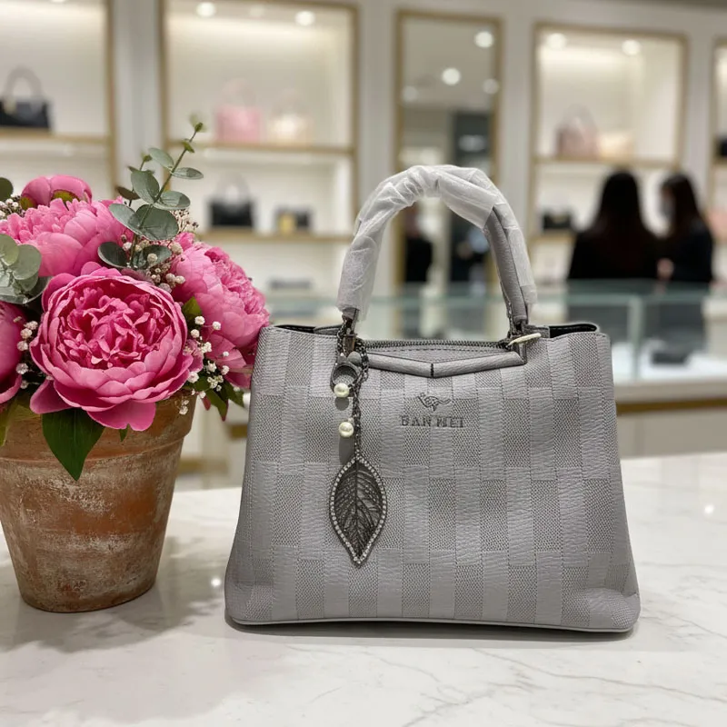 Light Gray Leather Handbag with Leaf